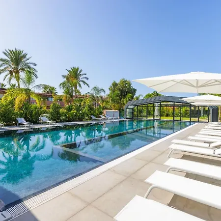 Апартаменты Corniola Wellness & *